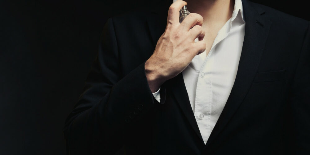 man using parfum