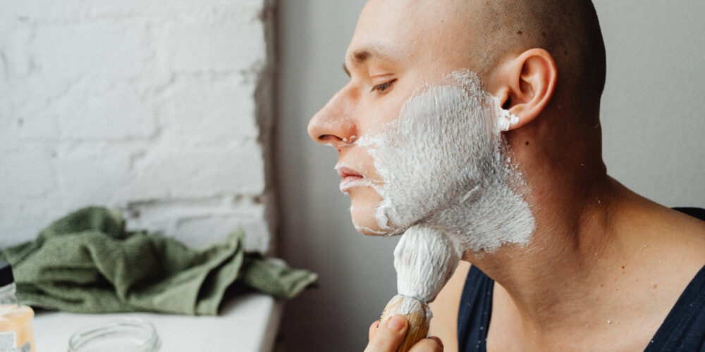 man-wet-shaving